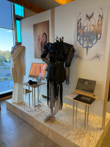 Fashion student showcasing sustainable and creative textile techniques.