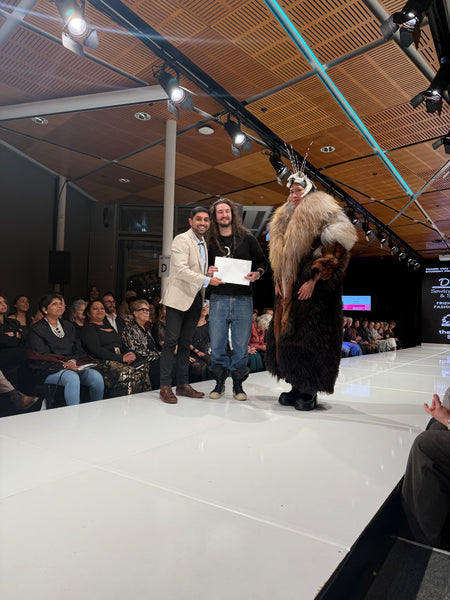 Shay Narsey from Direct Sewing Presents award at Otago Polytechnic prize giving for overall excellence